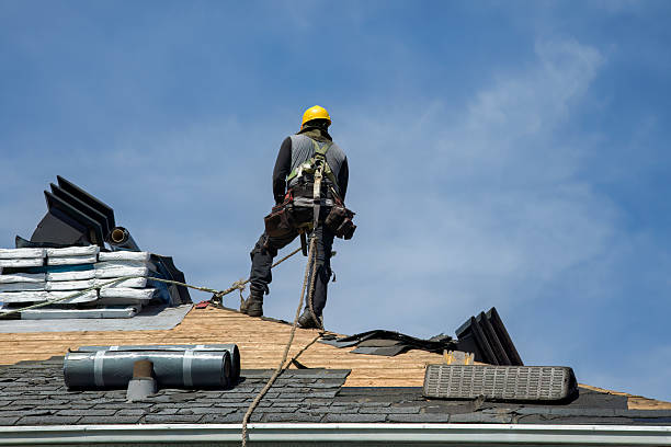 Professional Roofing technician working in Millbury, MA